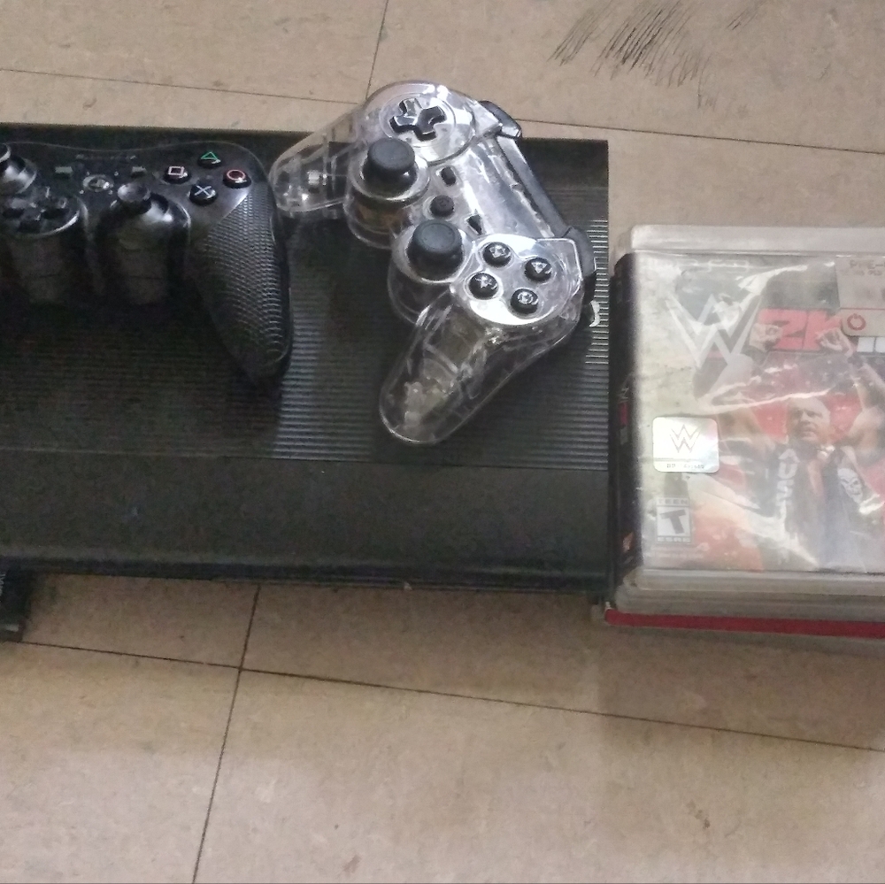 PS3 Sony Console with Black and Transparent Controllers